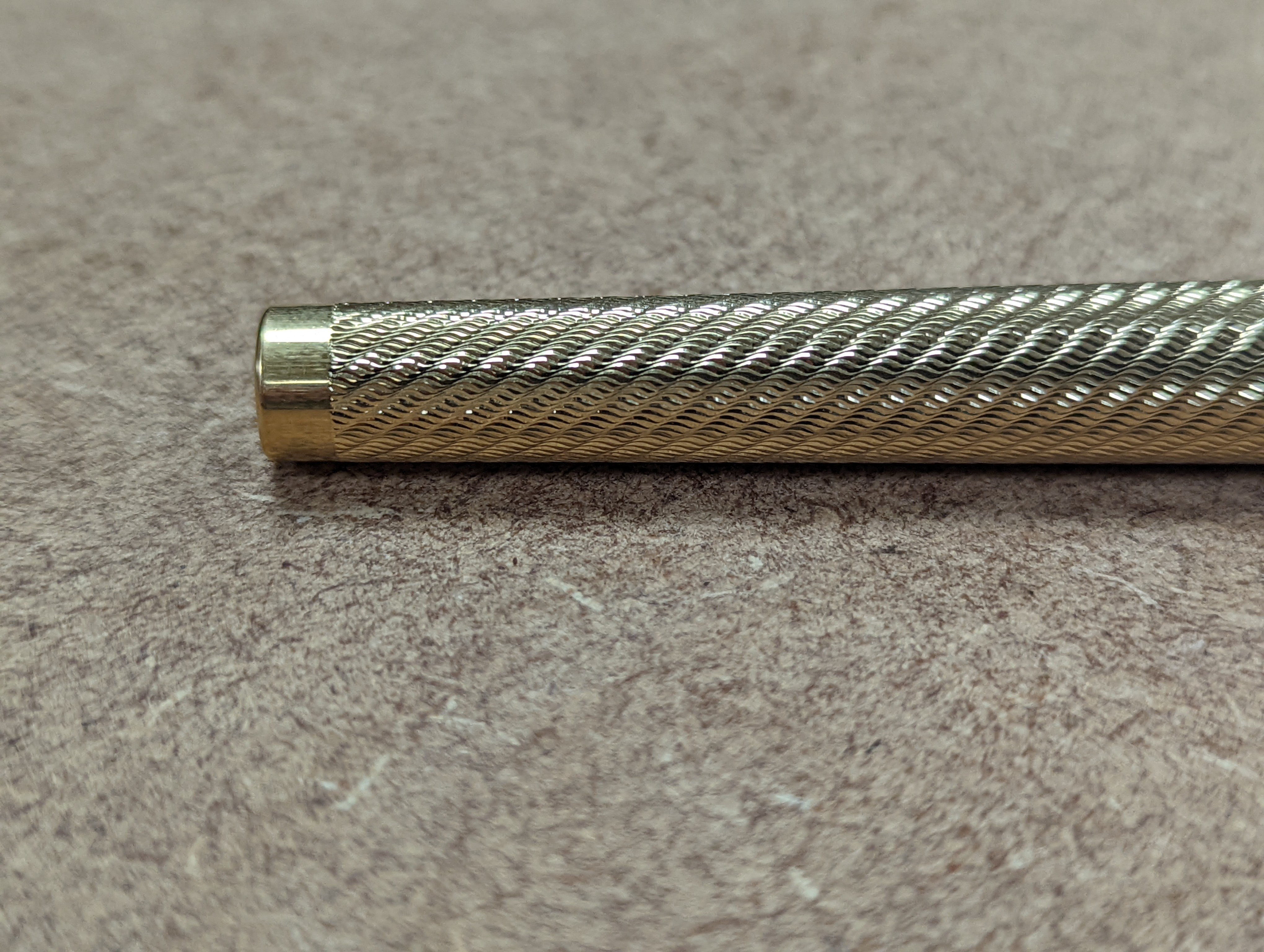 A cased gold plated Shaeffer fountain pen.